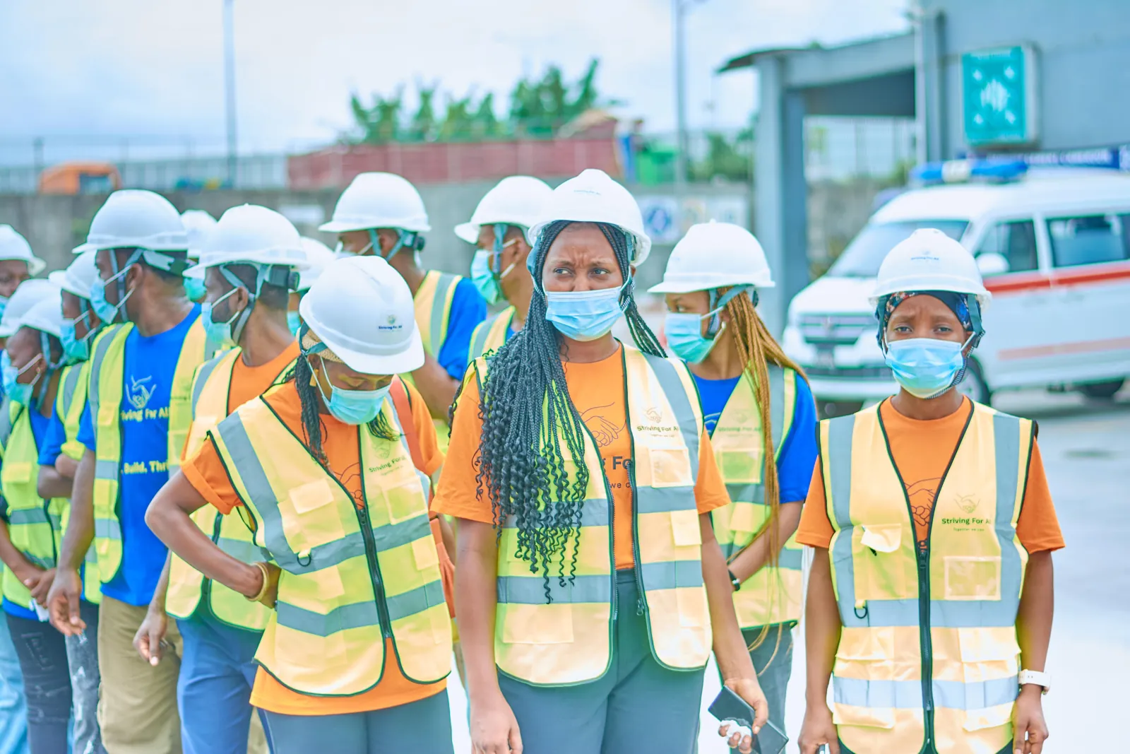 Women wearing face masks with helmets and striving for all jacket