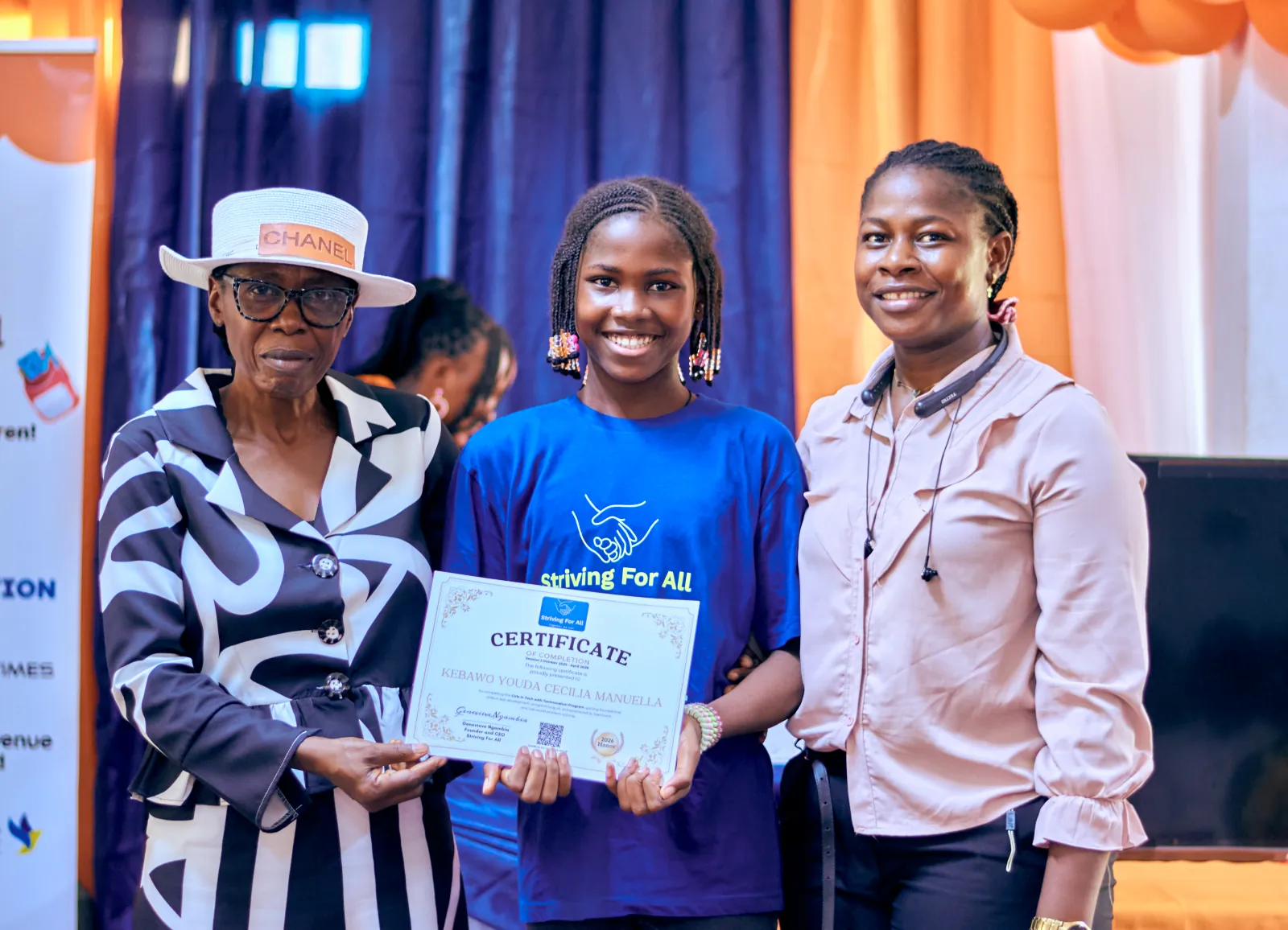 School admin with a parent and a girl with certificate