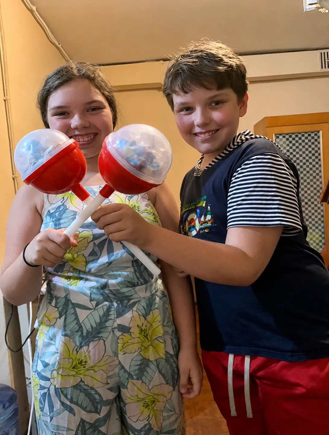 Ukrainian children holding their toys