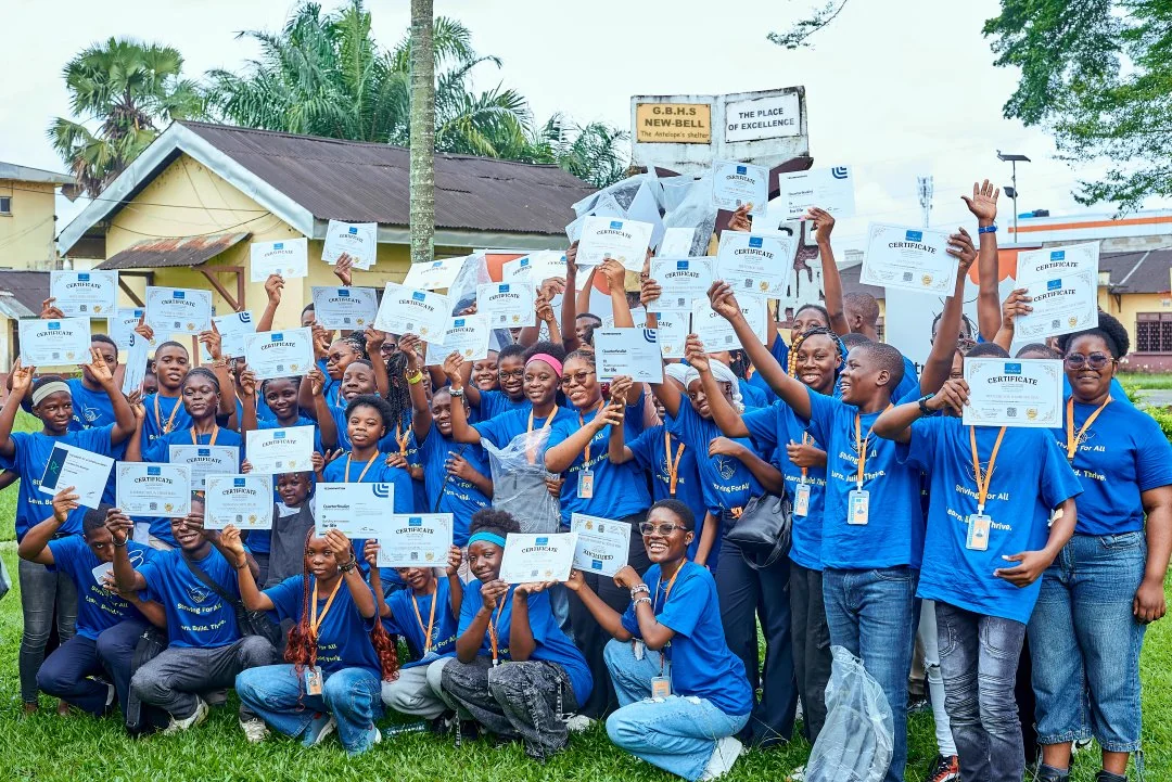 Learners celebrate together with certificates following the sixth Thrive Center training session