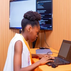 Girl typing on laptop