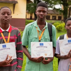 Students holding their certificate